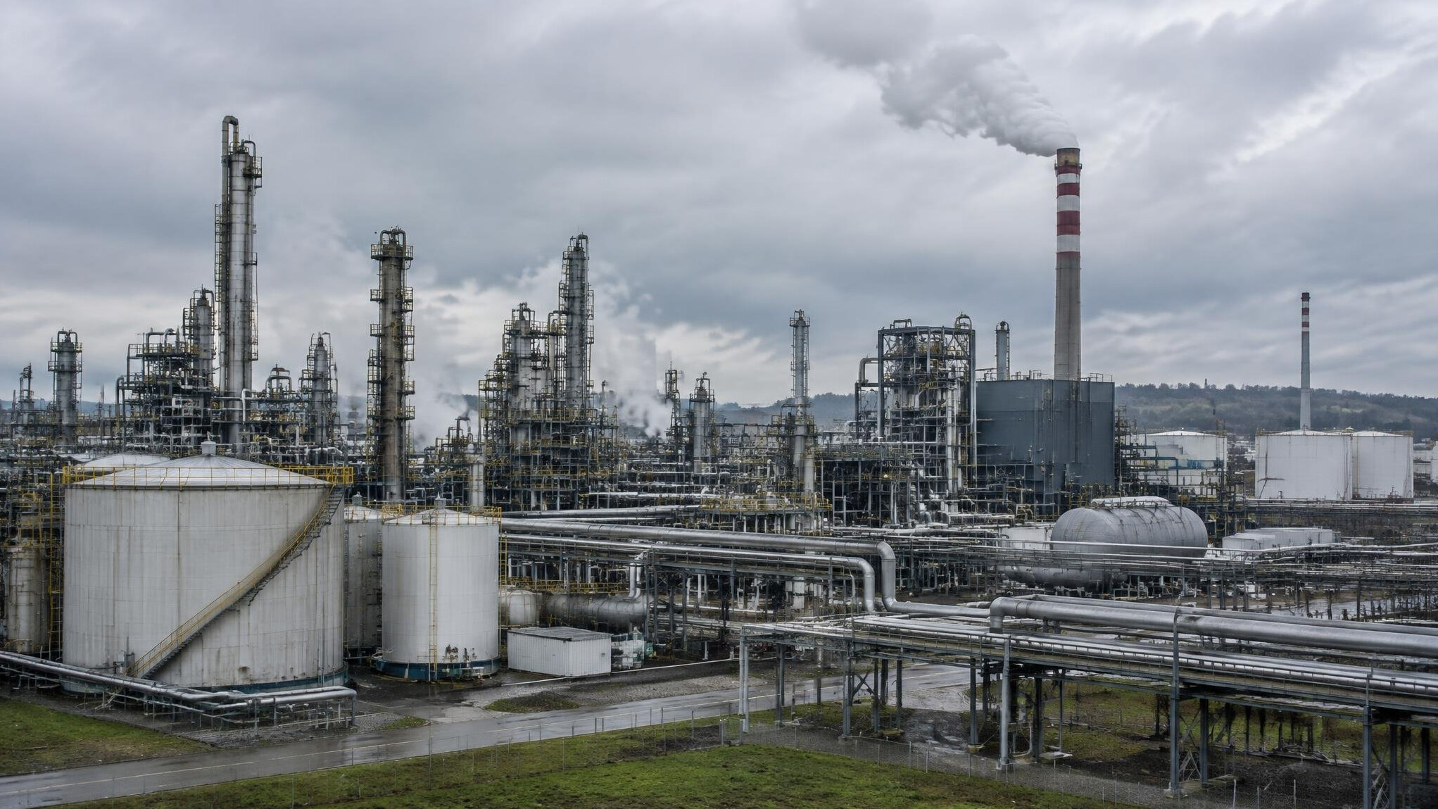 Industrial chemical plant with pipes and storage tanks